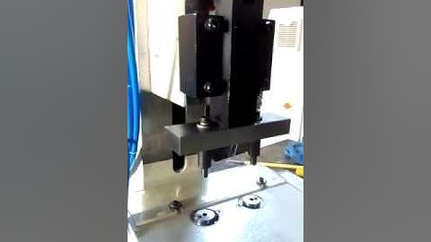 Clip riveting machine
