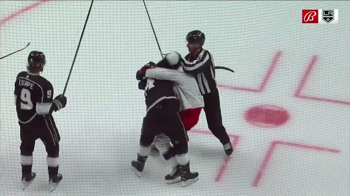 Philip Danault and Sean Kuraly grapple after the w...