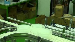 Slat conveyor round product singularisation