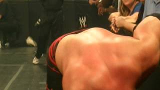 Rey Mysterio flips Kane over the railing onto our laps to the floor!