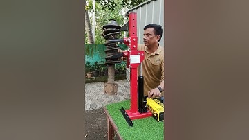 Hydraulic coil spring compressor