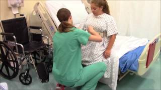 transferring patient from bed to chair