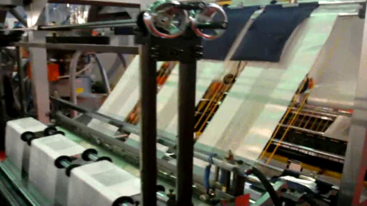 FTA3+PS    Fully Automatic Punching T shirt Bag   Banana Handle Bag Making Machine With Servo System