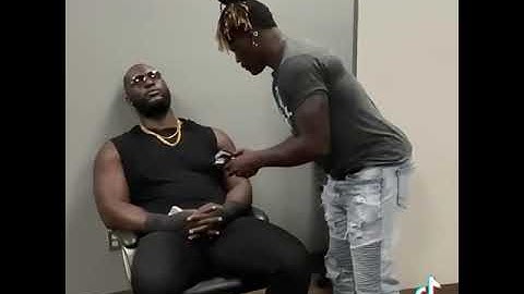 R-Truth tries to steal Omos