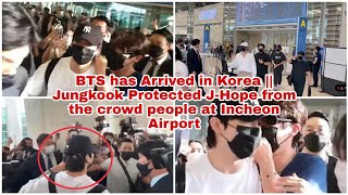 220602 BTS arrive in Korea || Jungkook protect J-Hope from crowd people at the Incheon Airport