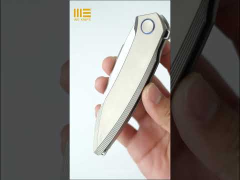 The WE Knife Fluxor pairs a gray titanium handlewith a hand-rubbed 3.98