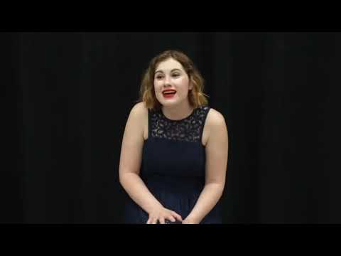 Female student singing.