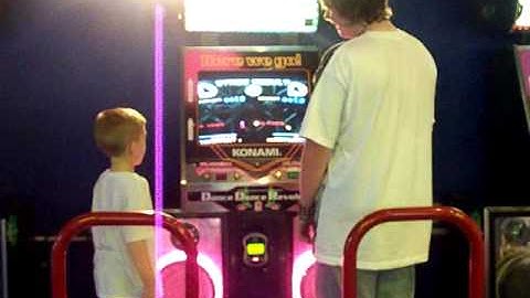 Uncle Robbie and Hayden Playing DDR At Boomers