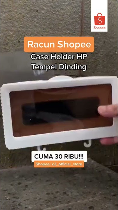 Case holder hp tempel dinding anti air