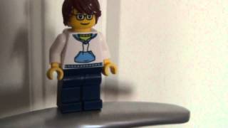 A Lego Fingure Falling Off A Door Knob