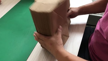 Roll fed paper bag making machine