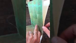 Sewing two signatures together