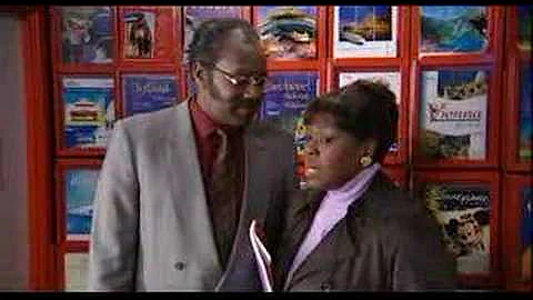 Donovan and Mrs Johnson in the travel agent