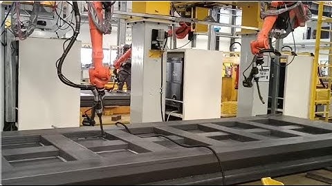 ATINY laser seam tracking sensor on KUKA welding robot working on a carriage plate