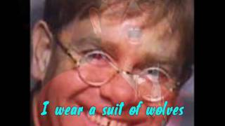 Watch Elton John Suit Of Wolves video