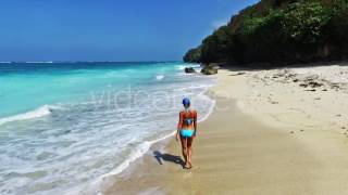 Girl Running On The Beach In Indonesia On Bali In Blue Bikini. Sea View Videohive 14488991