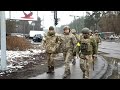 Ukrainian soldiers set up checkpoints in Hostomel, west of Kyiv | AFP