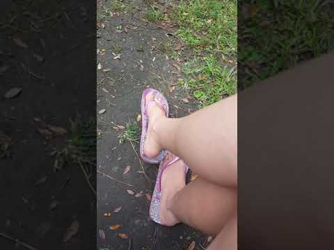 Purple flip flop dangling