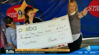 KFMB CBS 8 givn by posiba presents check for San Diego Humane Society to Savannah Lozano