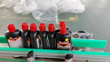 Flat bottle front and back two sides labeling machine test video SKILT