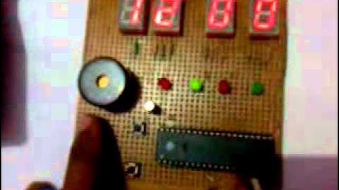 DIGITAL CLOCK WITH ALARM USING 89S52 MICROCONTROLLER