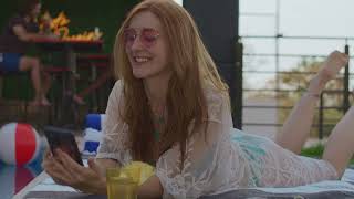 Woman Taking Selfies By The Pool