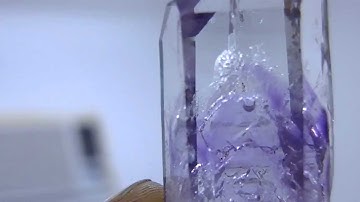 Water bubble inside amethyst quartz crystal from brandberg, Namibia