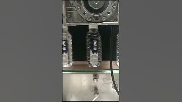 Flat Water Bottle Labeling Machine #labelingmachine #labelling #waterbottle #packagingmachinery