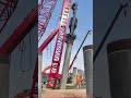 Red Piling Machine Roars into Action – Witnessing Engineering Miracles!”