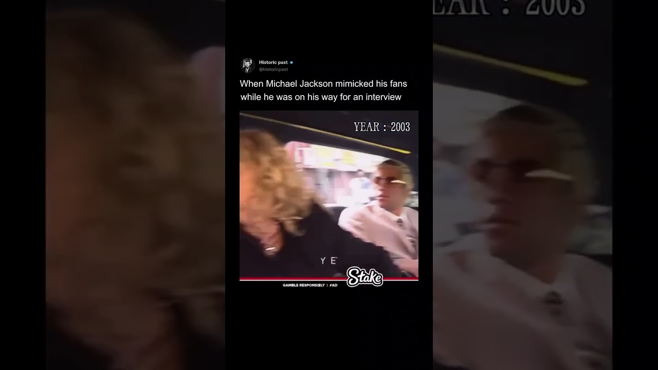 Michael Jackson was riding in the back of a limo when he began playfully mimicking his fans.