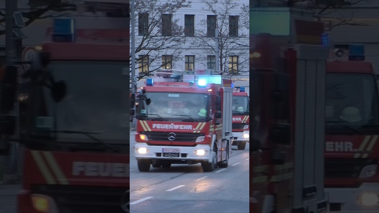 Das HLF 40/1 & 40/2 der FF. München Abt. - Mitte auf Einsatzfahrt zu einer Rauchentwicklung.