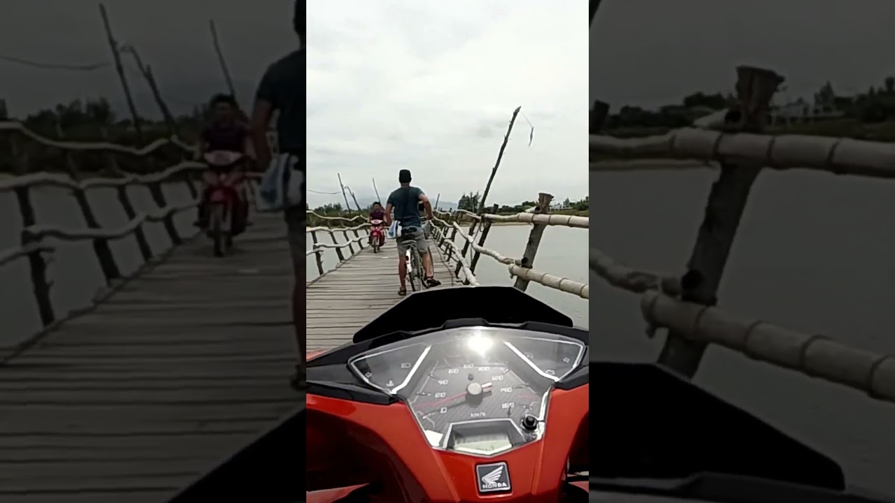 Traversing Time: Crossing Hoi An's Enchanting Plank Bridge
