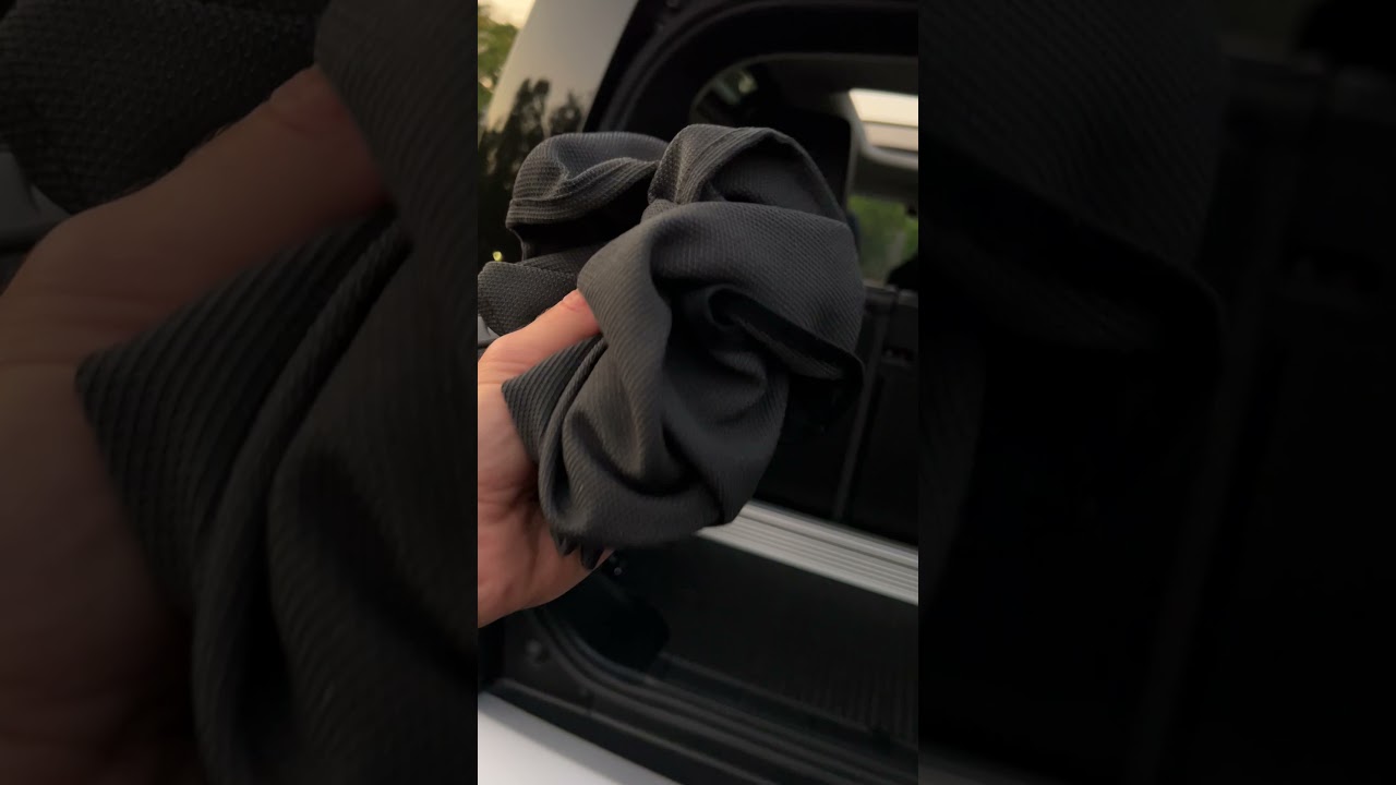 The Cargo Cover in the Land Rover Defender 90 can Fit in One Hand 