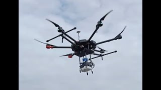 Osprey: Multi-Session Autonomous Aerial Mapping with LiDAR-based SLAM and Next Best View Planning