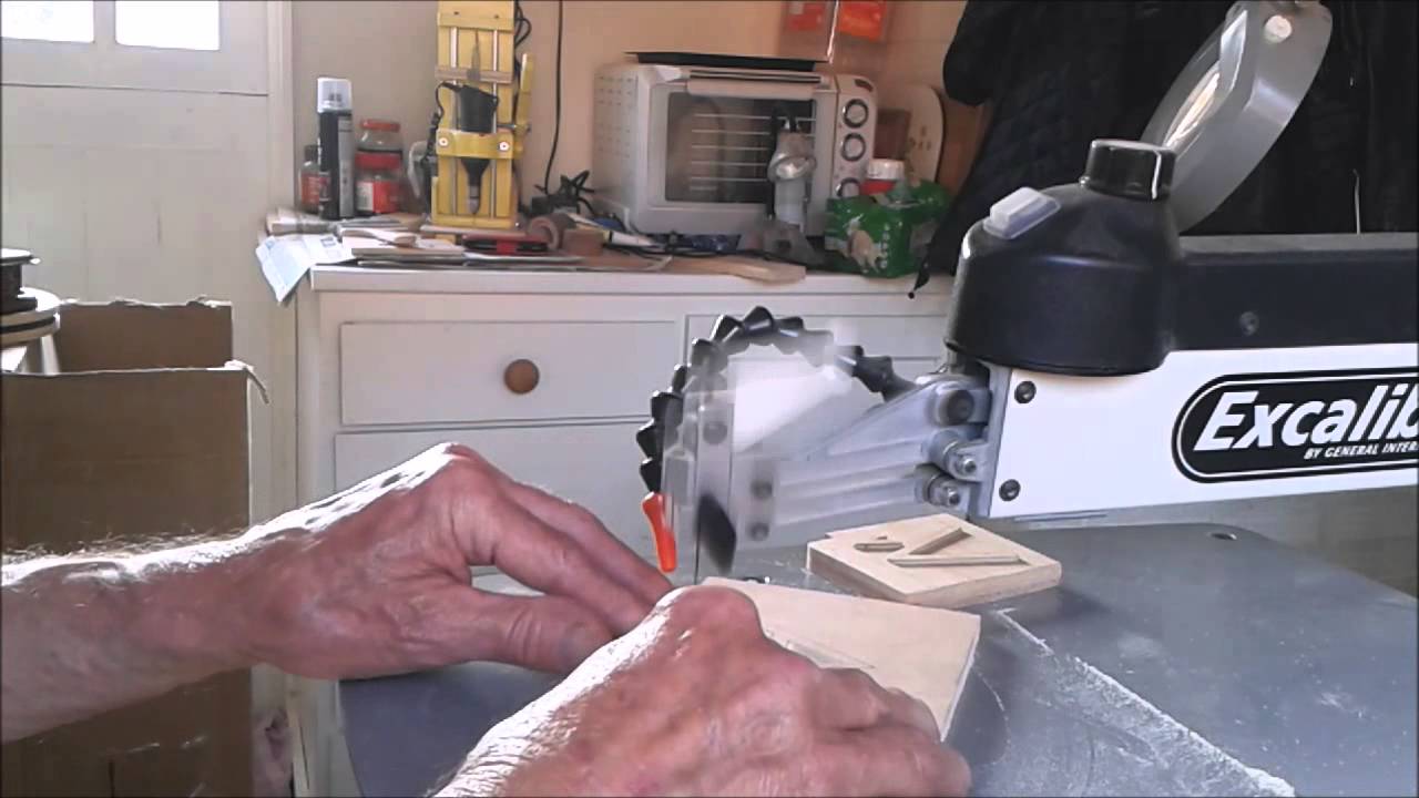 raised letters and figures on a scrollsaw