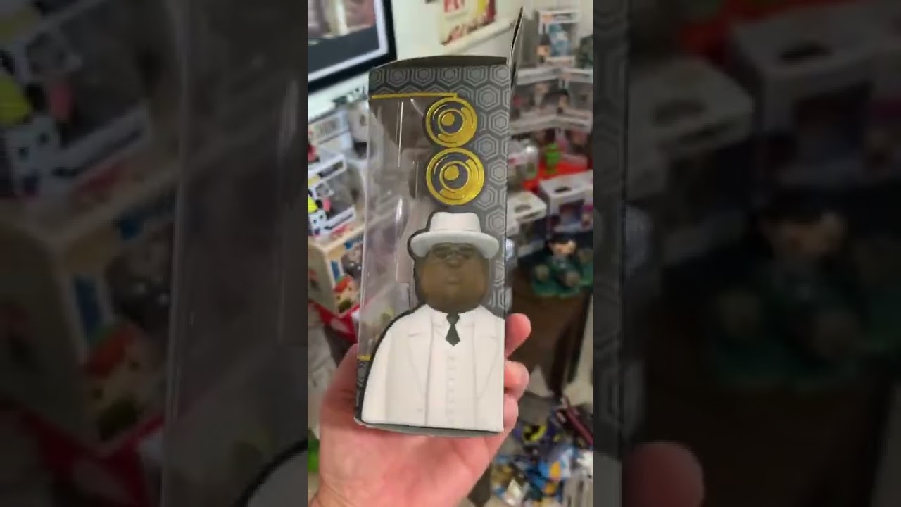 A Funko Premium Vinyl Figure Notorious B. I. G. Action Figure Toy.