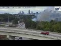 Lots of fire and smoke seen near Georgia 400 in Fulton County