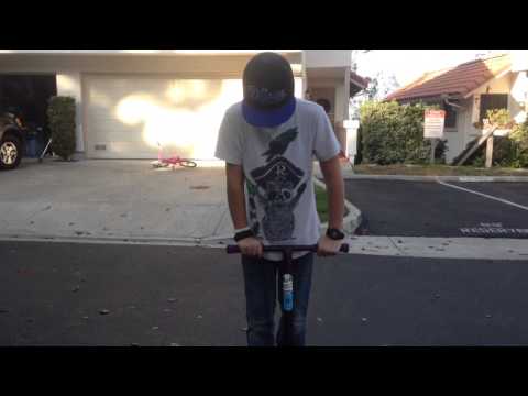 How To Do A J-Hop, Barspin und Tailwhip auf einem Roller