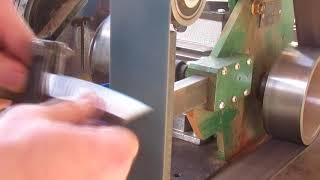 Grinding a bevel on a knive