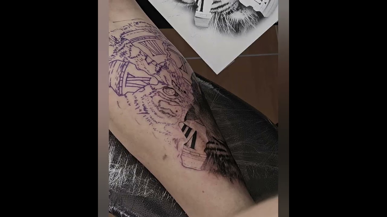 Time-lapse tiger tattoo