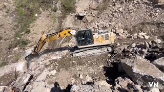 landslide cleared by cat Hitachi exacavator1713100147578182