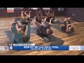 Kenny tests his flexibility at Soul Yoga