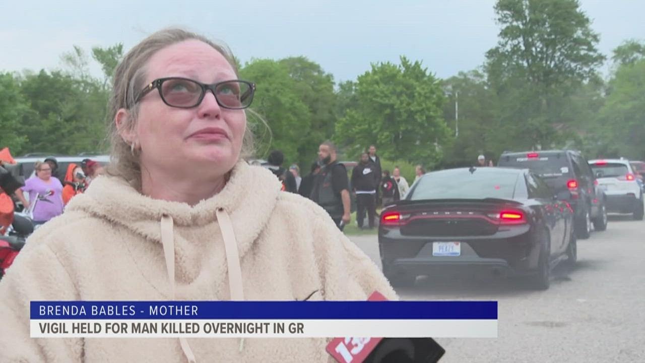 Vigil held for man killed in weekend shooting - YouTube