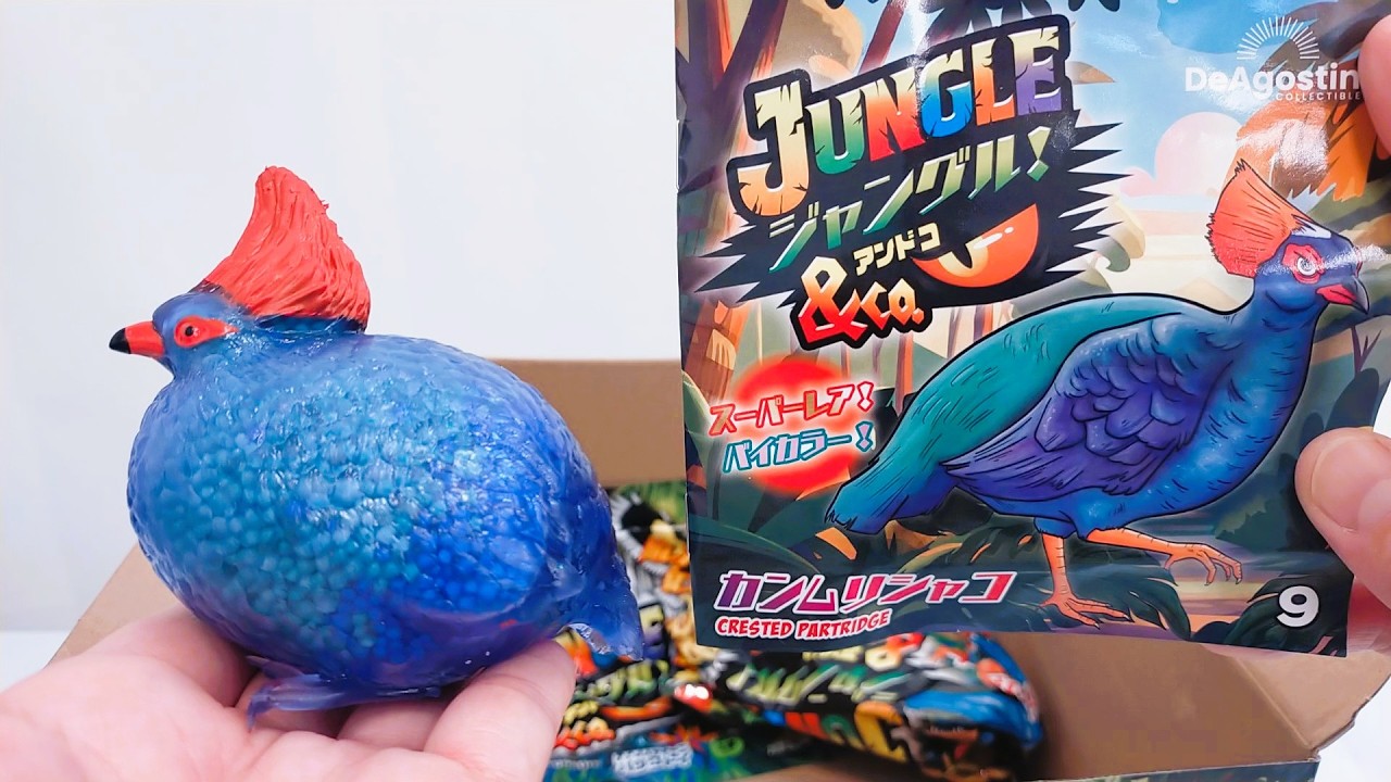 Jungle & Co. Crested Partridge Unpacking a bag of animal toy