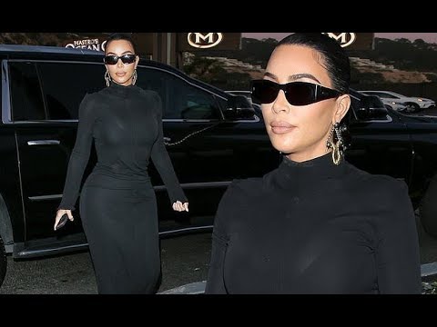 kim-kardashian-covers-up-head-to-toe-in-a-sleek-black-dress-as-she-arrives-for-dinner-in-malibu-with