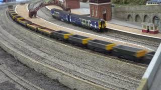 The B.M.Rly.S on N Gauge Layout - The Class 47 BR Large Logo Blue No.47635 with Empty Open Wagons.