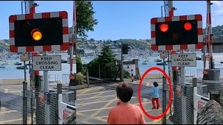 Child Runs onto Level Crossing as Lights Flash