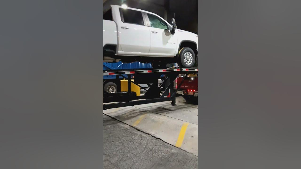  short ford 4by4 redtruck carhaulertrailer twowhite trucks fueltime am