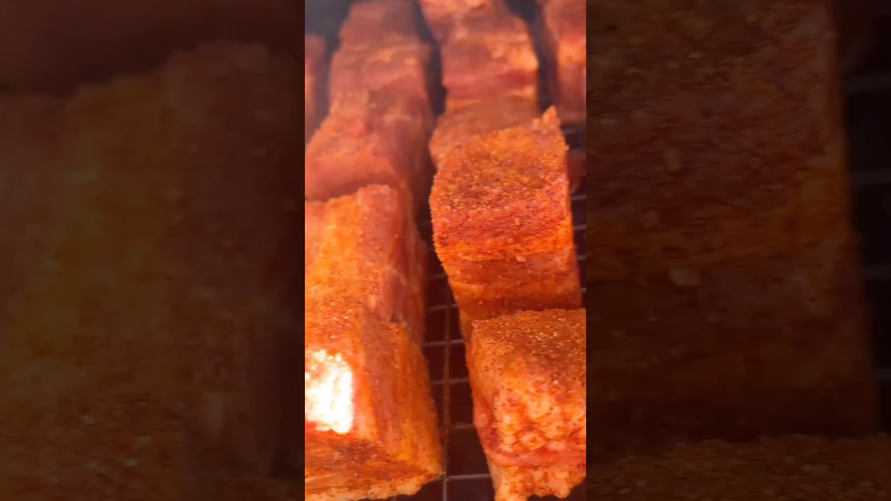 Smoked pork burnt ends in honey sauce.         