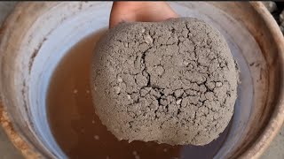Stoney Black Sand Crumbling in Water